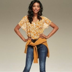 Cabi 3598 Thrive Mustard small floral double chiffon lined short-sleeve top.